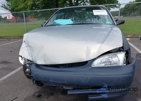 1999 Toyota Corolla Ce z USA, uszkodzony, nr VIN 2T1BR12E9XC180124